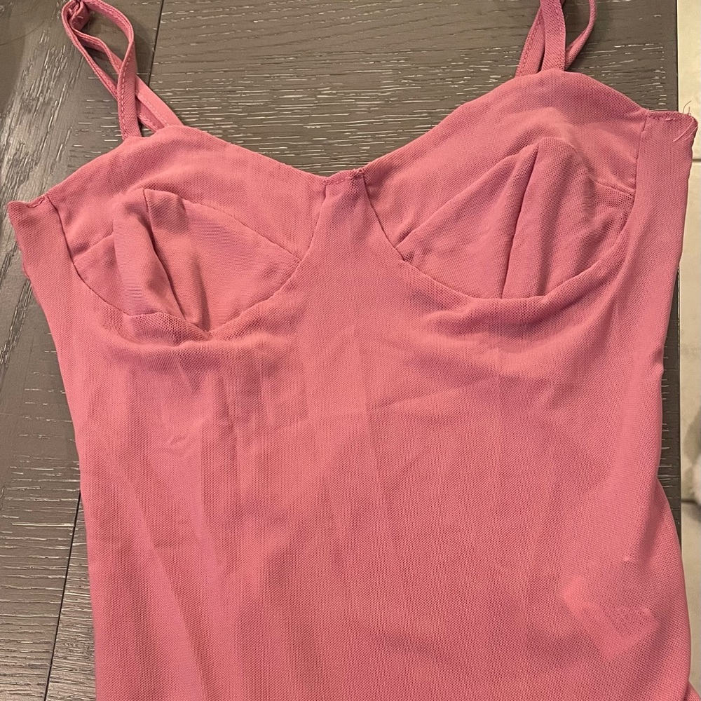 Pink body suit